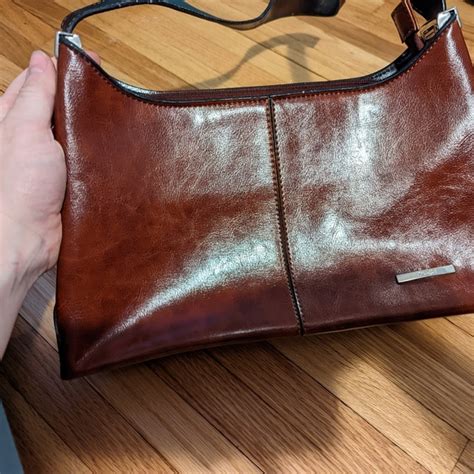 rina rich handbag price